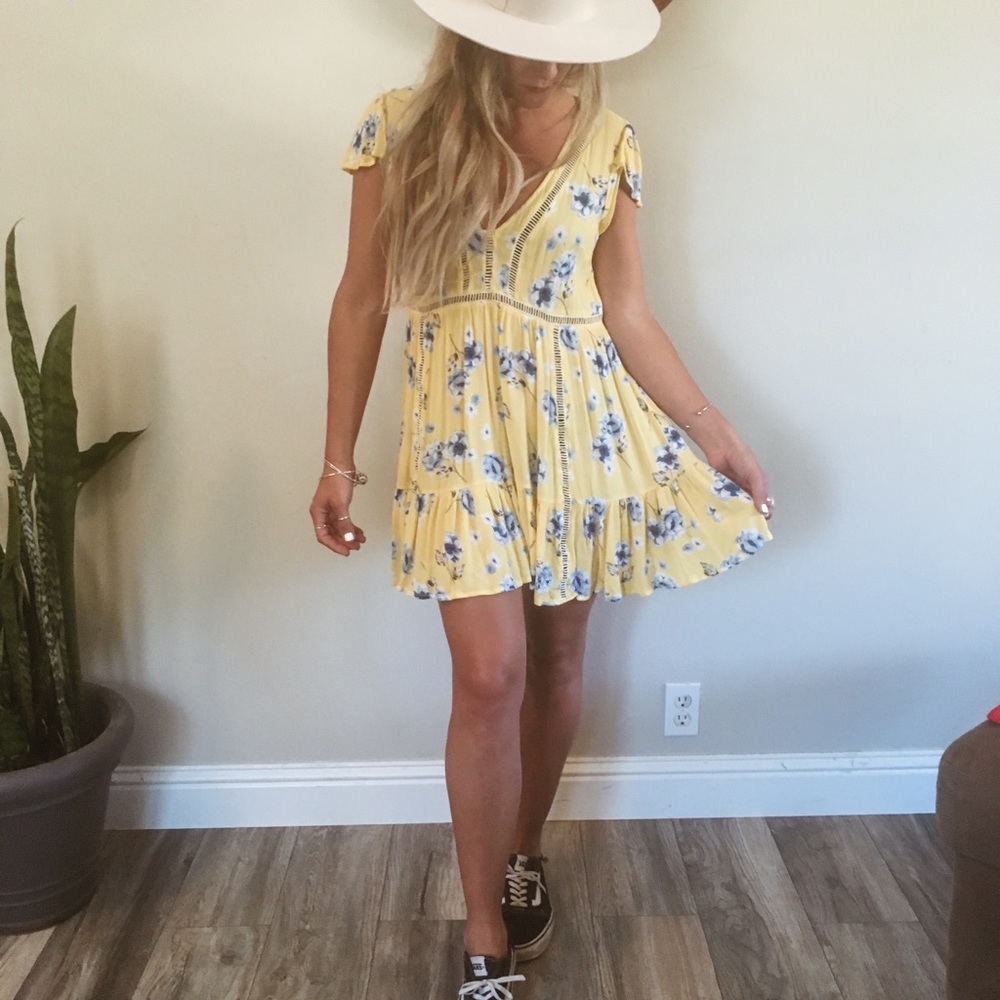 Yellow sundress with blue floral print